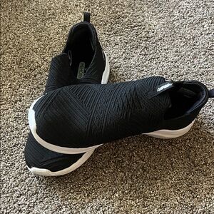 Skechers Black and White Slip-On Athletic Shoes